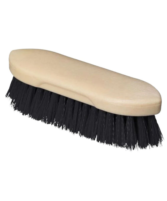 A grooming brush with a light beige plastic handle and dense black bristles, shown on a plain white background.