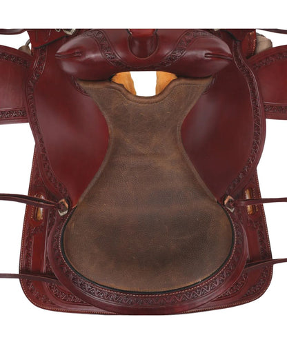 Close-up view of the 16" double-padded grainout seat, 4" cantle, and the mountain pass border tooling