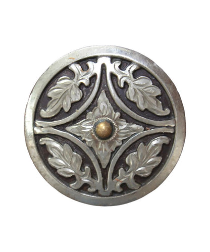 Close-up view of the iron vine hardware