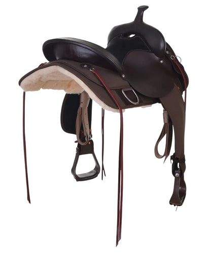 Right angled back view of the walnut leather trail saddle featuring the stainless steel hardware, 4" cantle, and cordura skirt and fenders