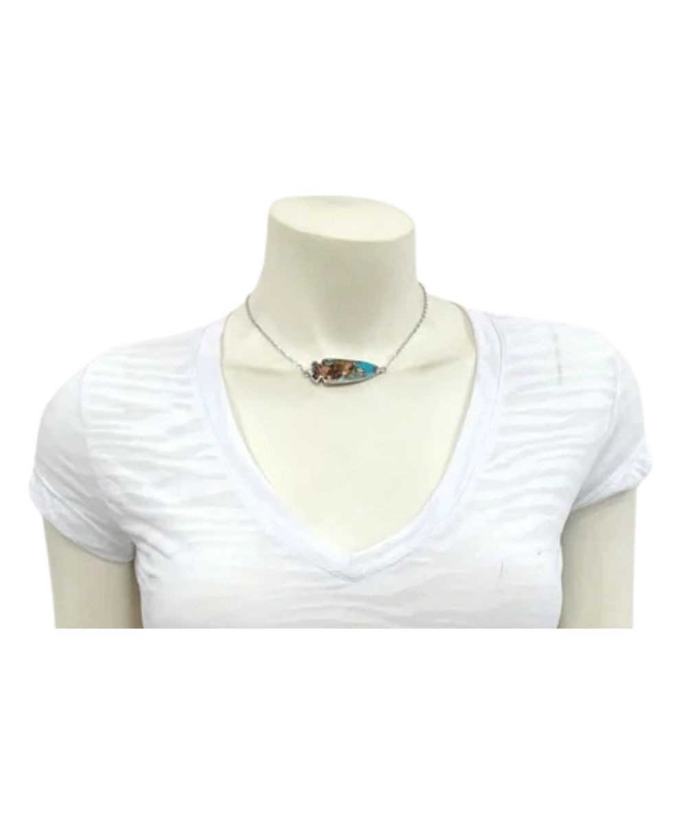 Model view of the women's arrowhead Isac Trading necklace featuring the navajo-style arrowhead bezel setting gemstone pendant