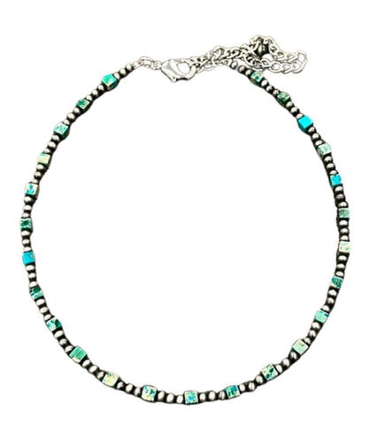 Flat lay view of the women's 15" necklace with a 5" extender