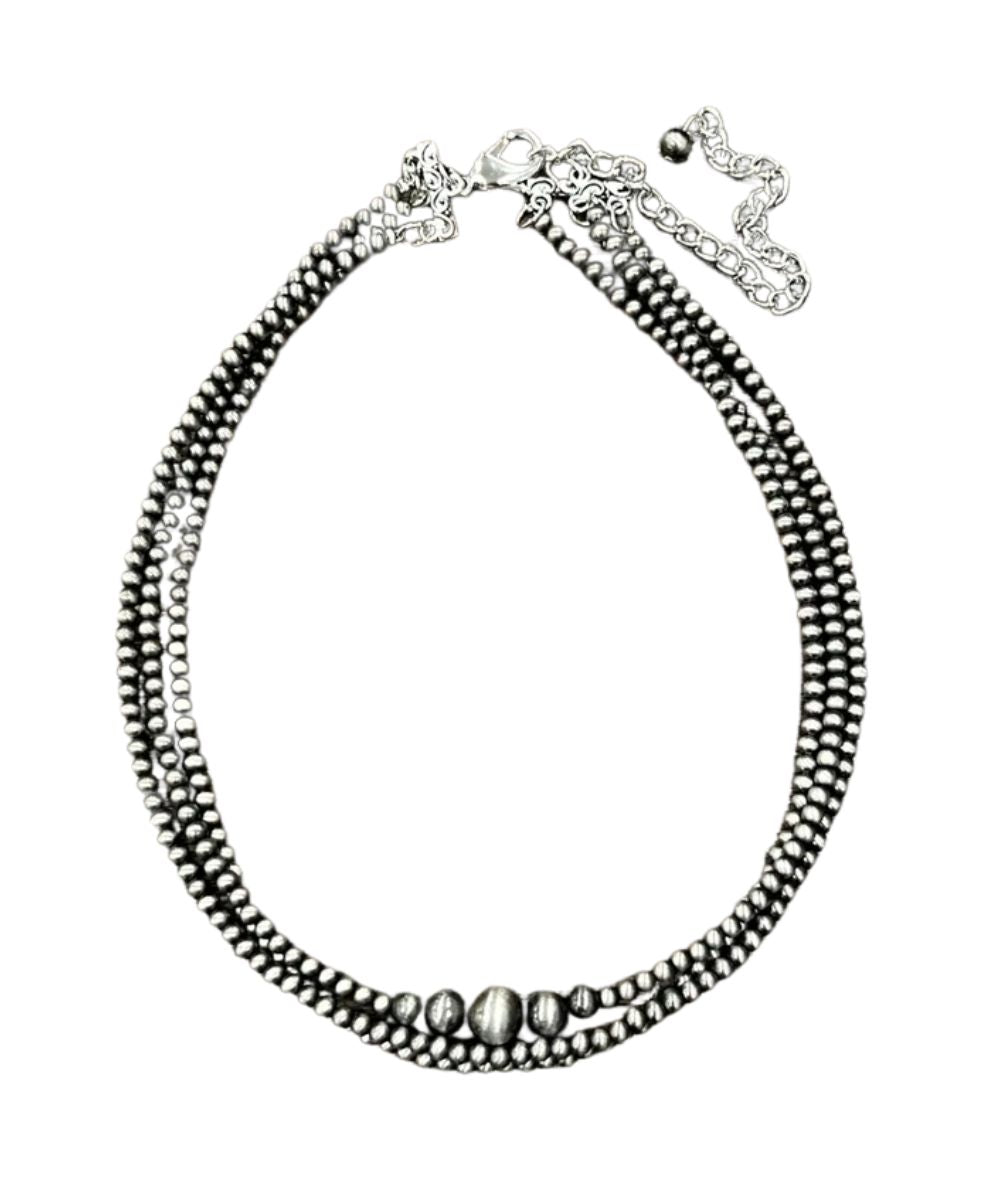 Flat lay view of the women's 15" necklace with a 5" extender