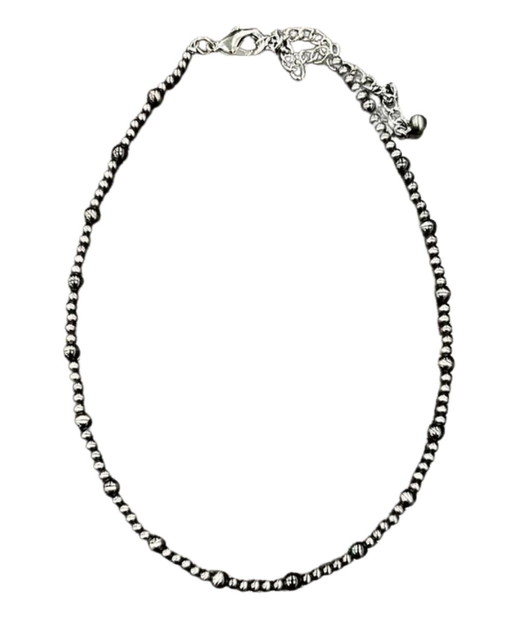 Flat view of the women's silver navajo style western necklace featuring the 16" length with a 5" extender