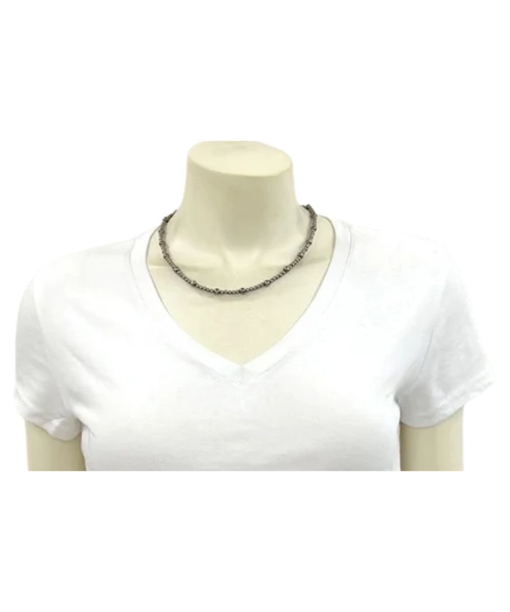 Model view of the women's silver Isac Trading 16" Polish Western Bead Necklace featuring the navajo-style beads