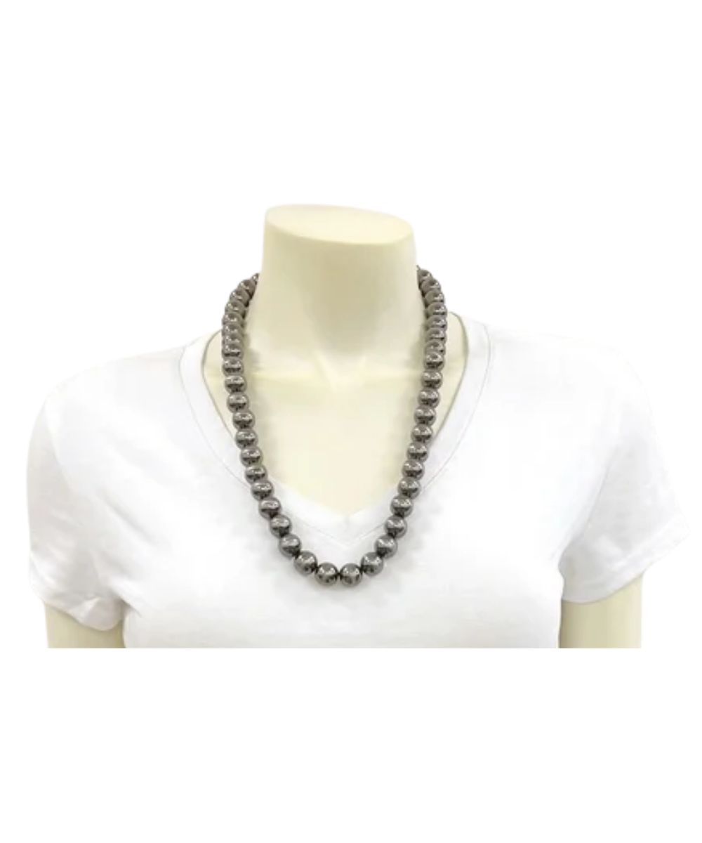 Model view of the women's silver Isac Trading Necklace featuring the big handmade polished western beads