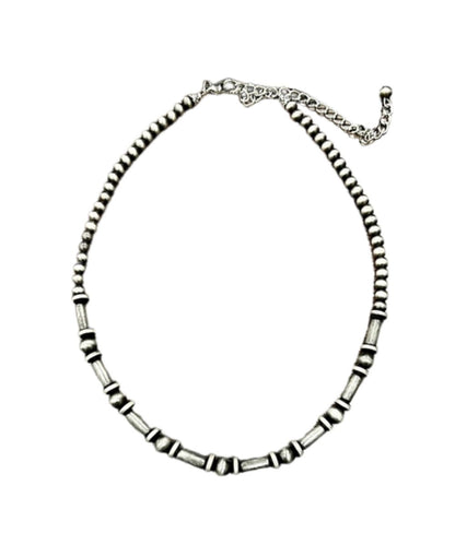 Flat view of the women's faux navajo pearl beaded necklace
