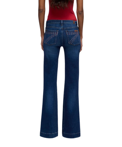 Back view of the women's slim illusion dark wash jean featuring crystal embellished logo back pockets 