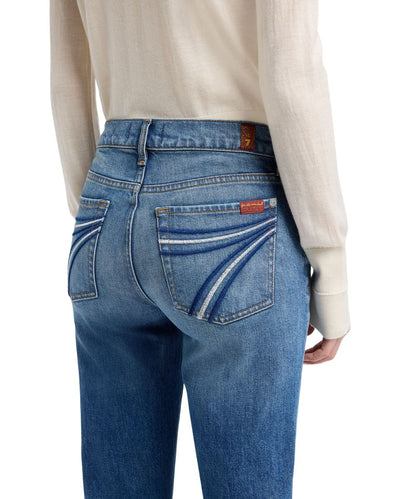 Close-up view of the back pocket featuring the signature '7' embroidery in blue and white