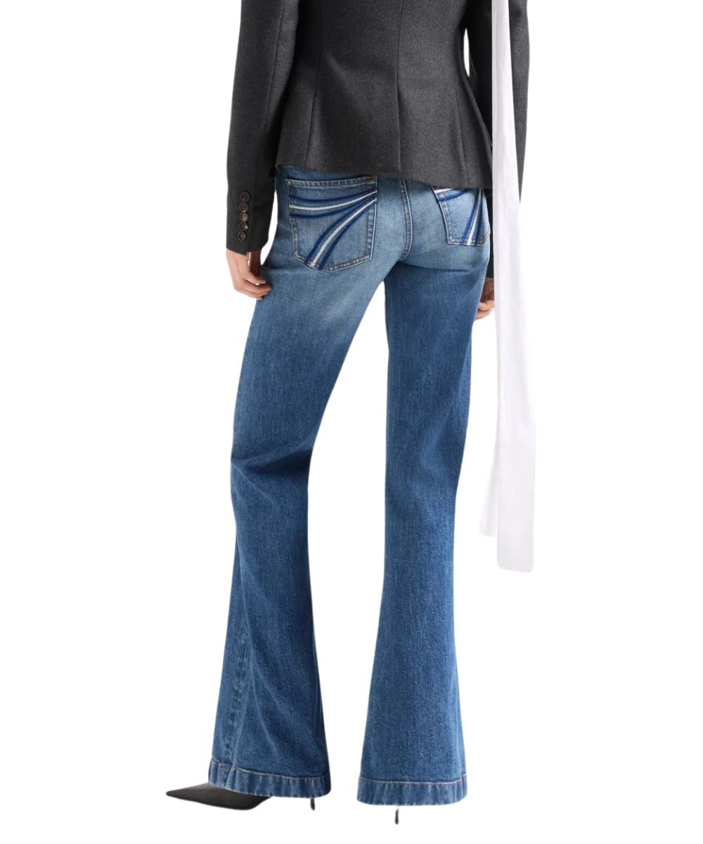 Back view of the women's bluefern mid wash trouser jean featuring the subtle flare leg with a trouser hem and mid rise