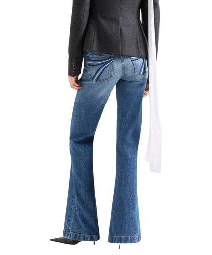 Back view of the women's bluefern mid wash trouser jean featuring the subtle flare leg with a trouser hem and mid rise