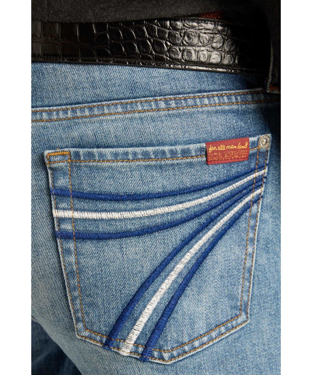 Close-up view of the signature '7' back pocket embroidery in blue and white