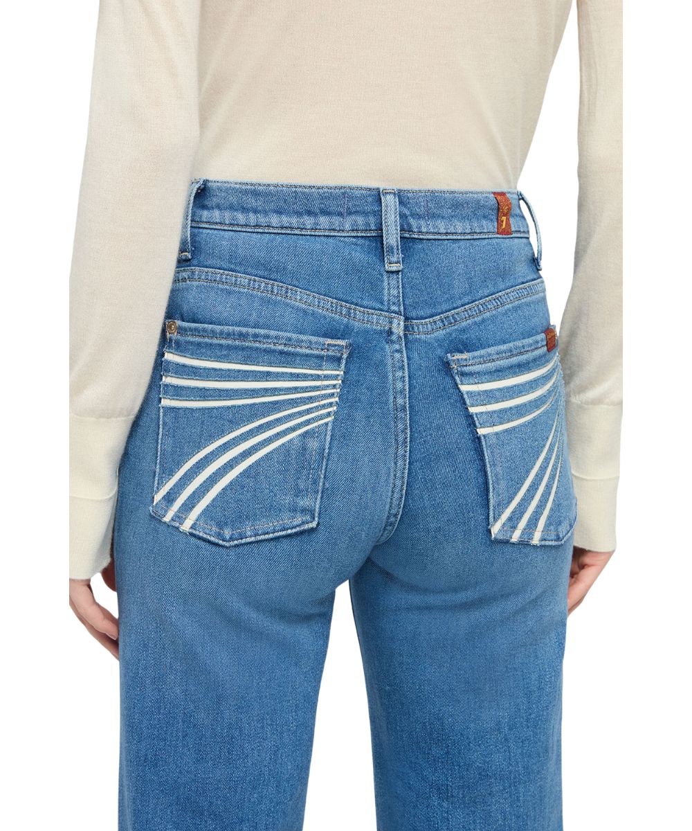 Close-up view of the contrast logo stitched back pockets