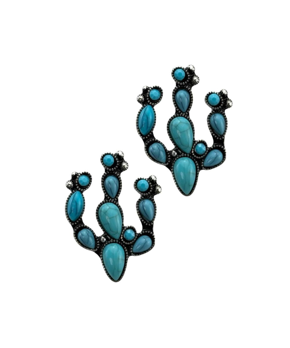 A pair of Southwestern-style turquoise cactus cluster earrings with teardrop-shaped turquoise stones set in black oxidized metal, shown on a plain white background.