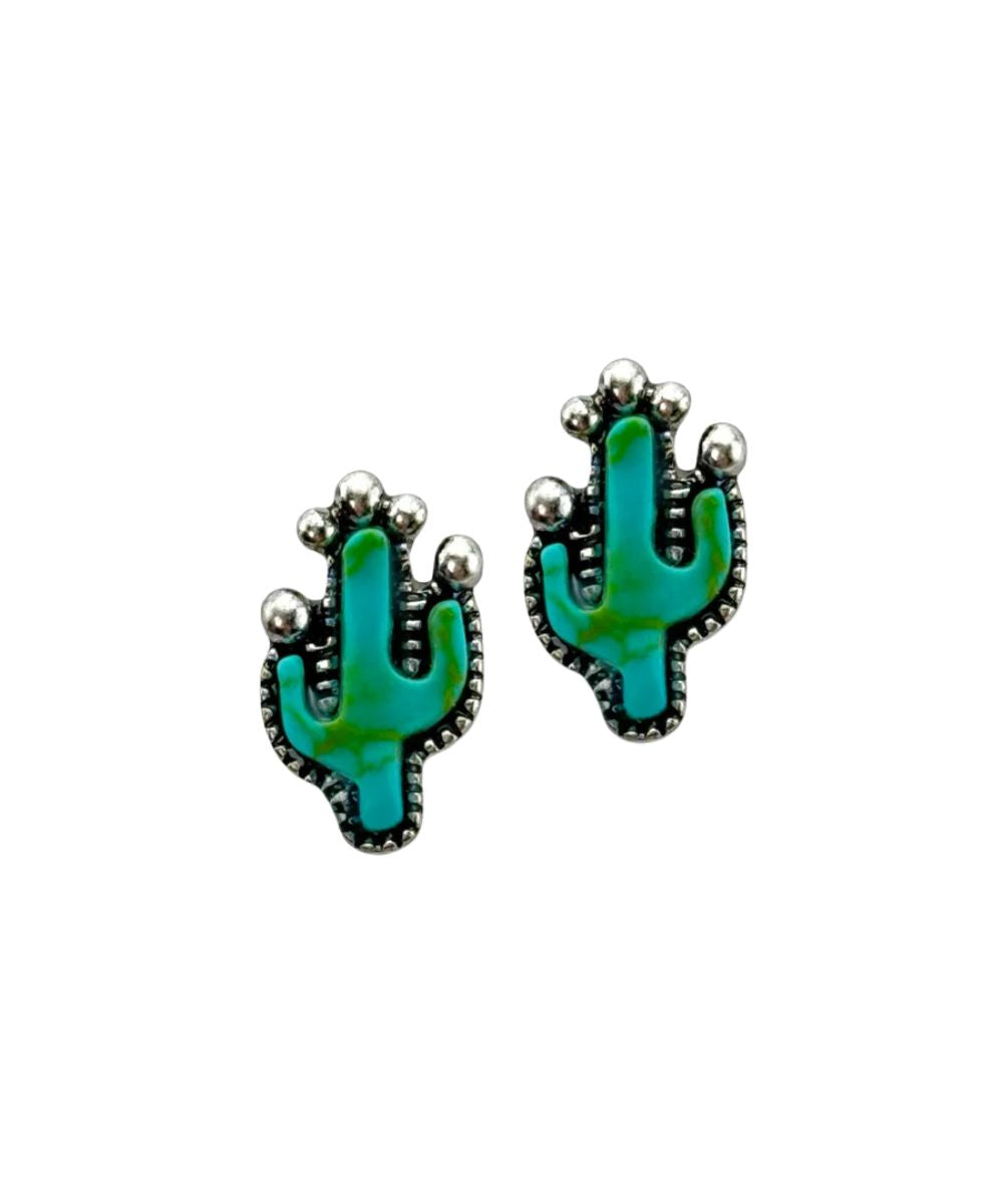 A pair of cactus-shaped stud earrings with turquoise green inlay and silver-tone beaded borders, shown on a plain white background.