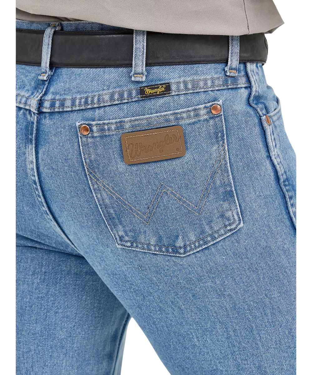 Close-up view of the logo stitched back pockets with a neolite Wrangler logo patch