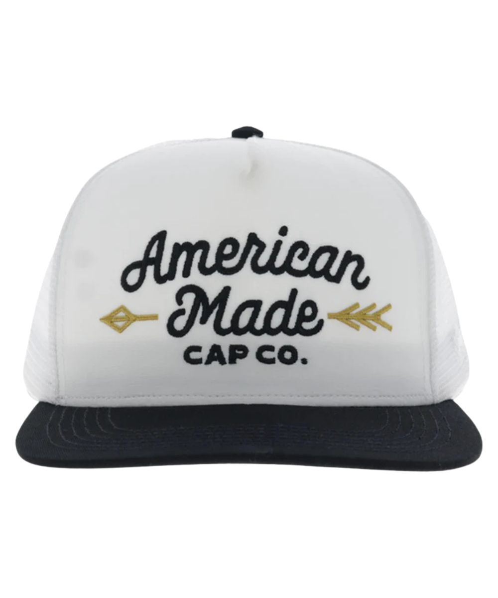 Front view of the white trucker cap featuring the 5 panel construction, and a high-profile fit