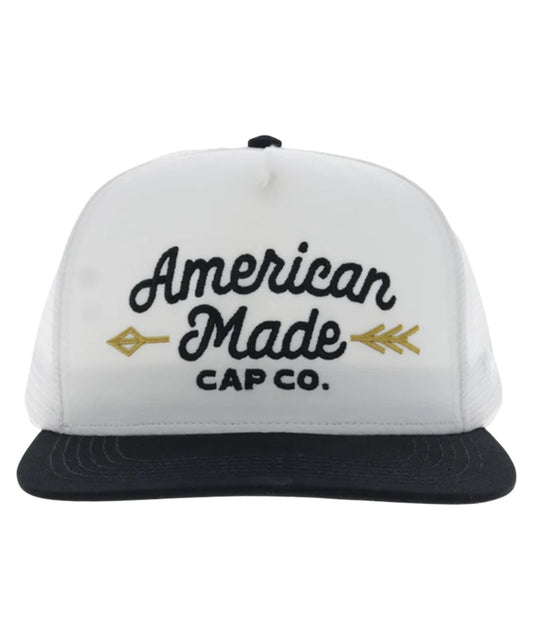 Front view of the white trucker cap featuring the 5 panel construction, and a high-profile fit