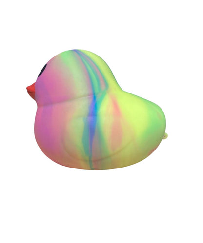 A novelty rubber duck with a pastel rainbow marbled pattern of pink, green, yellow, and blue, featuring a small orange beak and black eyes, isolated on a white background.