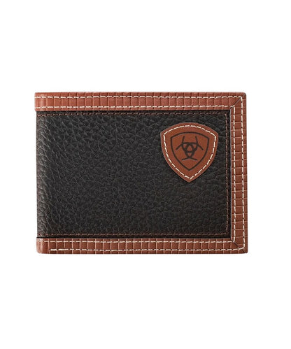Front view of the men's brown leather Ariat bifold wallet featuring the textured leather body with red trim and the red Ariat Shield Logo patch