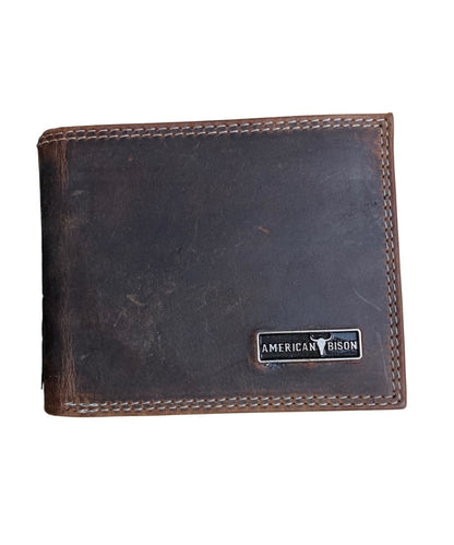 Front view of the men's brown American Bison leather bifold wallet featuring the silver logo plate on the front