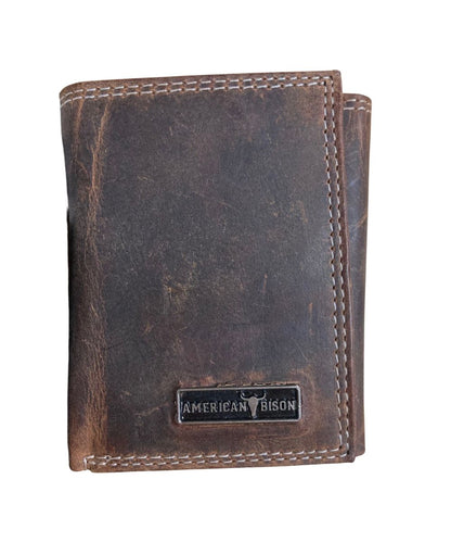 Front view of the men's brown American Bison leather trifold wallet featuring the silver logo plate on the front