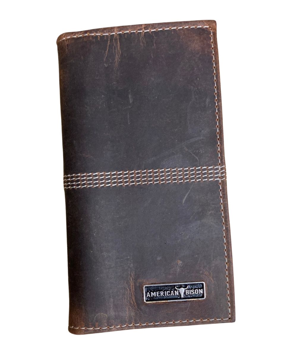 Front view of the men's brown American Bison leather rodeo wallet featuring the mid-stitch detailing and the silver logo plate on the front