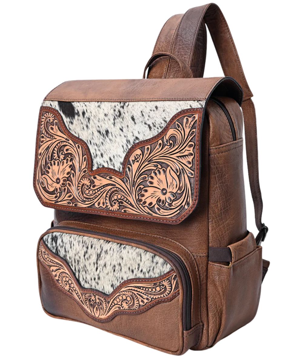 American Darling leather backpack featuring a spacious design, floral tooling, and hair-on-hide accents.