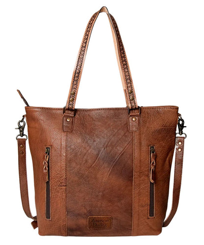 Smooth brown leather back with a dual-entry zippered pocket.