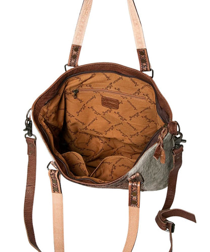 Spacious interior contains 1 zippered pocket and 2 open pockets.