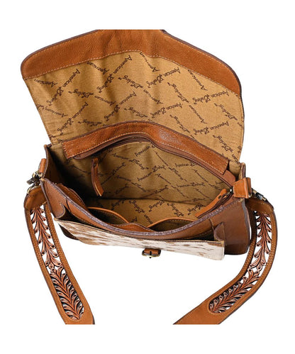 Spacious interior, removable shoulder strap, zip closure, and a flap cover with pocket underneath.
