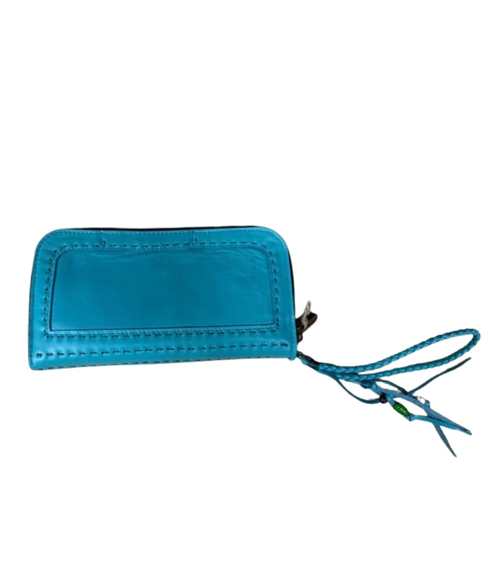 Back view of the women's mint green leather wristlet Pranee wallet featuring the braided wristlet strap and leather tassels with beaded accents
