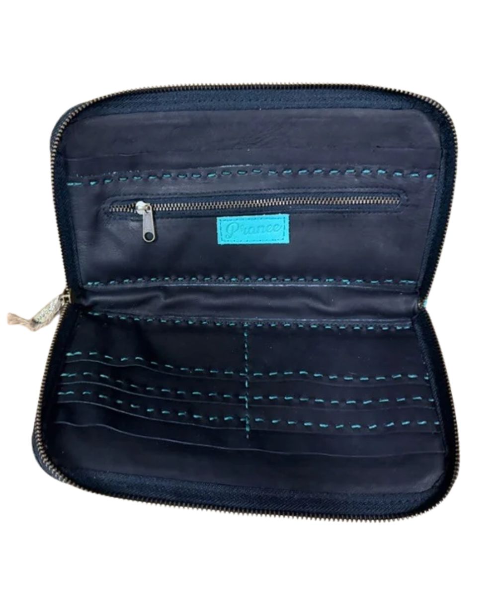 An open zippered wallet or organizer with multiple interior card slots, zipper pocket, slip pockets, and a small mint green brand label 