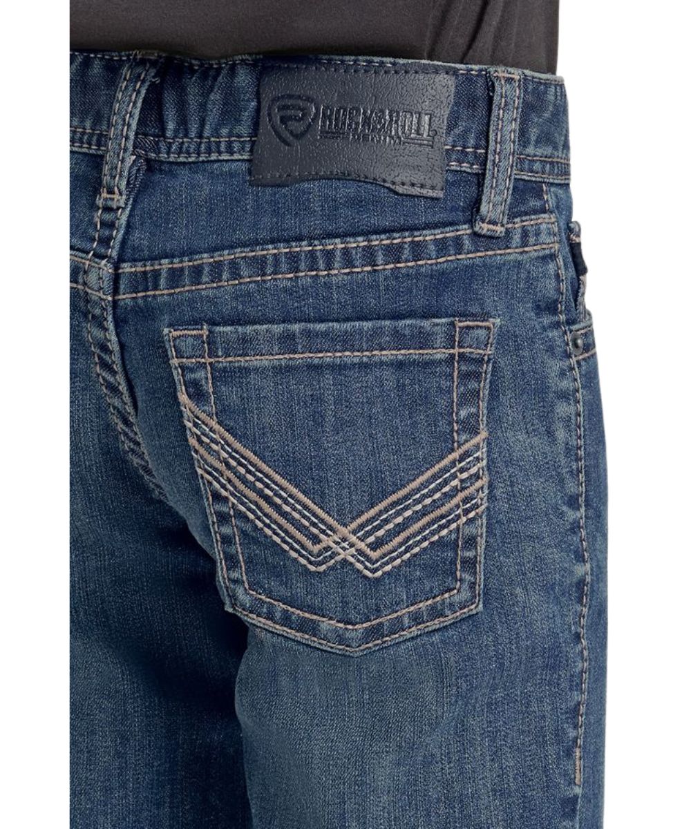 Close-up view of the rope stitch embroidered back pockets