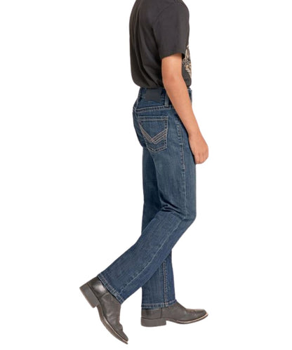 Side view of the boy's dark wash slim straight leg jean
