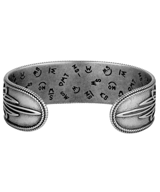 Back view of the women's silver cuff bracelet featuring the boot stitch designed sides