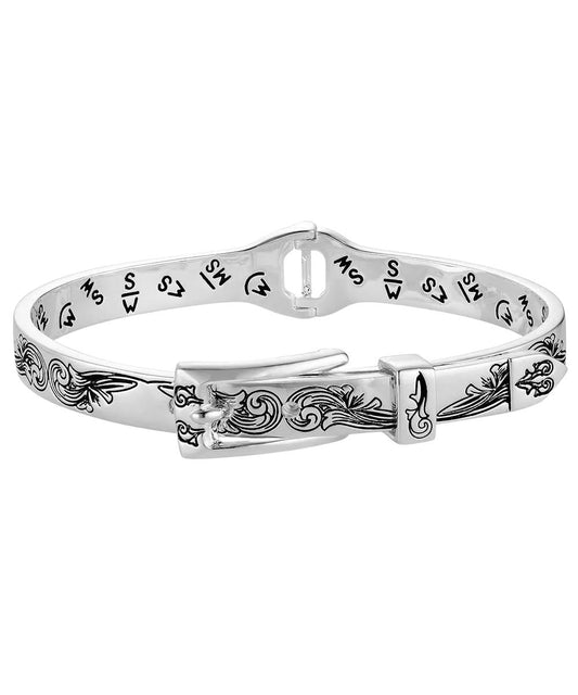 Side view of the women's silver buckle bracelet featuring the intricate engraved designs