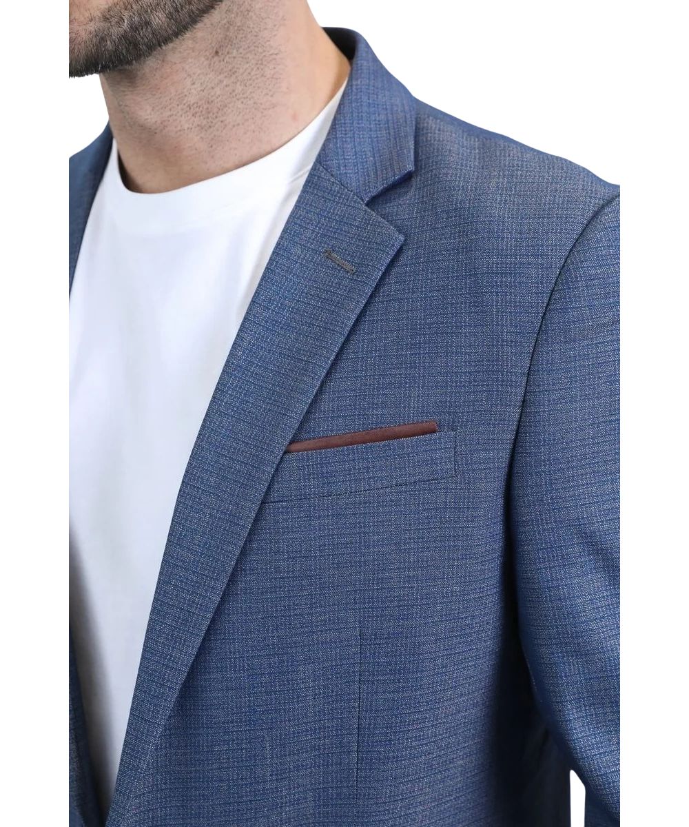 Close-up view of the chest pocket with a pocket square and the notched lapel collar