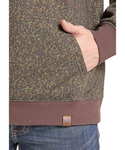 Close-up view of the olive camo print and brown contrast rib knit trim