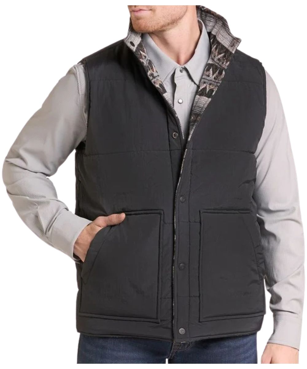 Front view of the men's solid black reverse side of the Rock & Roll Cowboy grey aztec vest featuring the mock collar, snap closure, and hand pockets