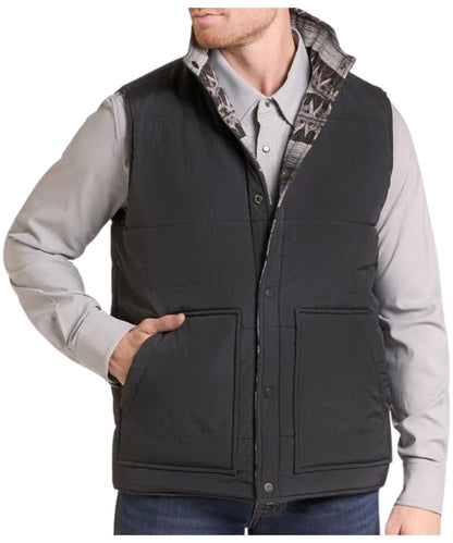 Front view of the men's solid black reverse side of the Rock & Roll Cowboy grey aztec vest featuring the mock collar, snap closure, and hand pockets
