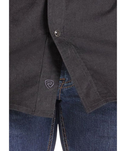 Close-up view of the men's black corduroy long sleeve snap shirt
