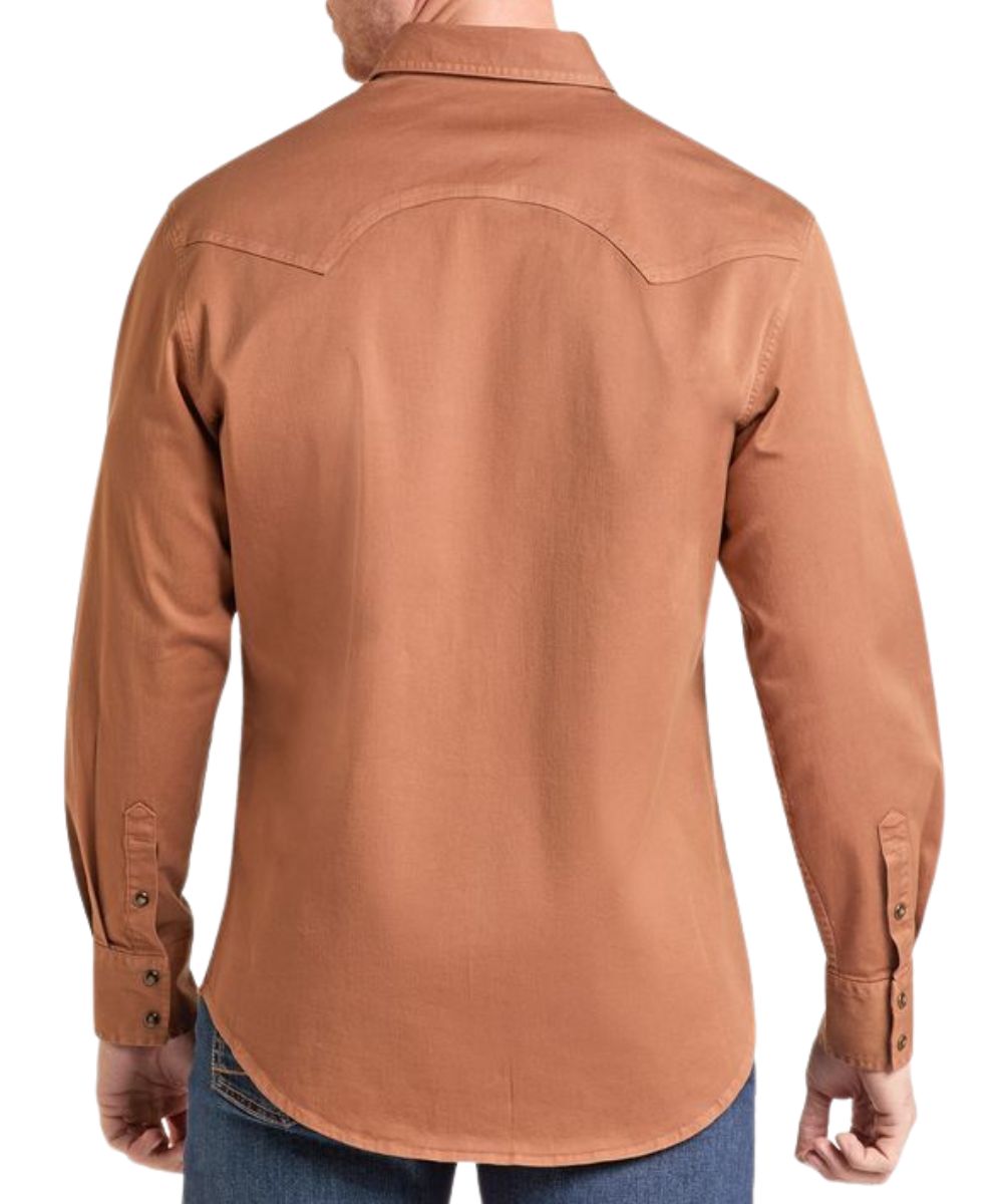 Back view of the men's long sleeve washed denim snap shirt in a camel brown color featuring the modern fit and double pointed back yoke