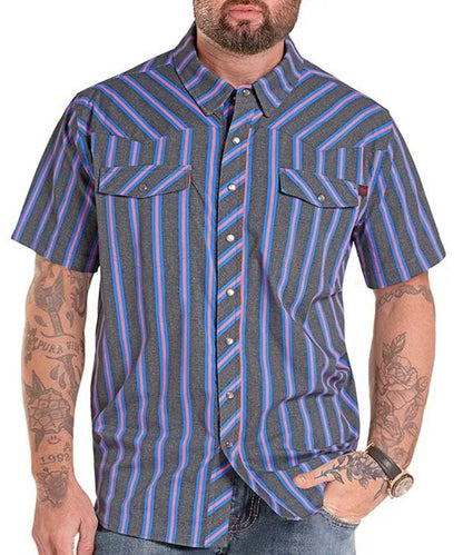 A man wearing a short-sleeve button-up shirt with a gray, blue, and pink striped pattern, paired with blue jeans.