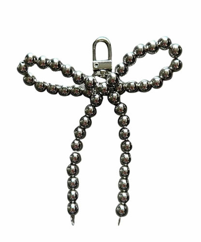 BOW PURSE CHARM-black ! desc :  ! caption :