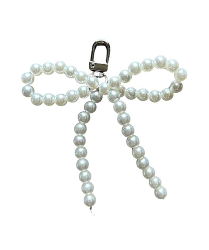 BOW PURSE CHARM-black ! desc :  ! caption :