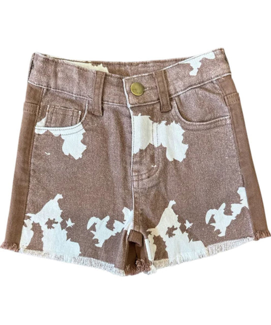 Brown And White Cow Print Front Featuring A Raw Hem