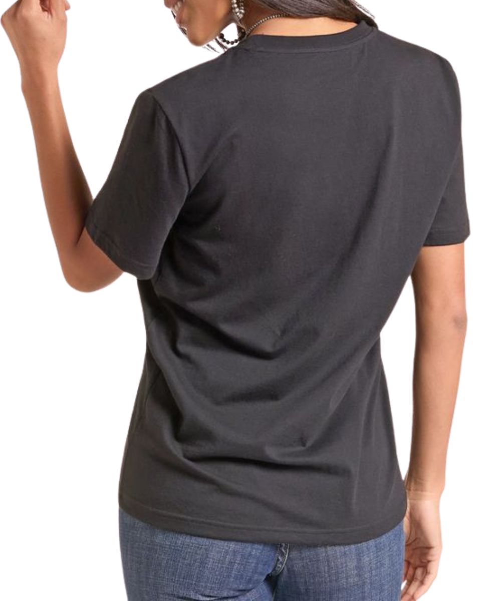 Back view of a woman modeling the black graphic tee