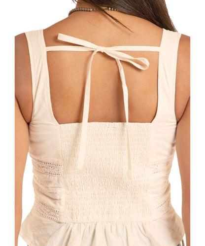Back view of the natural women's tank top featuring a self-tie, square neckline, and smocked detailing