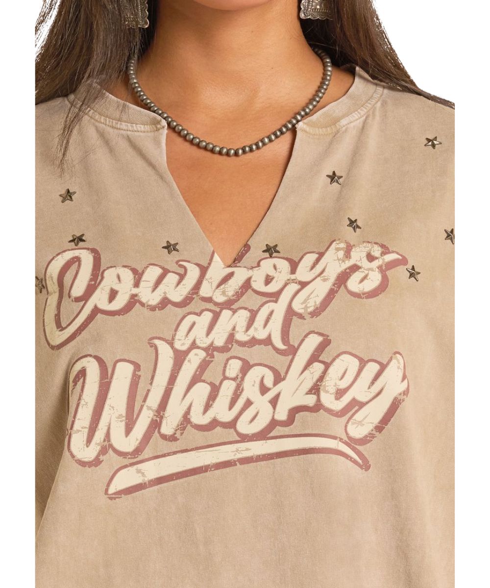 Distressed front screen printed graphic reads: "Cowboys and Whiskey" featuring star studded accents.